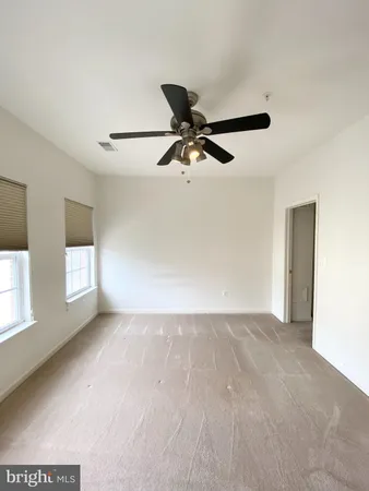 a bathroom with a shower and a bath tub