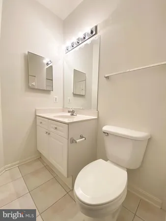 a bathroom with a toilet and a bathtub