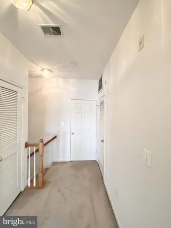 a spacious bathroom with a double vanity sink mirror and