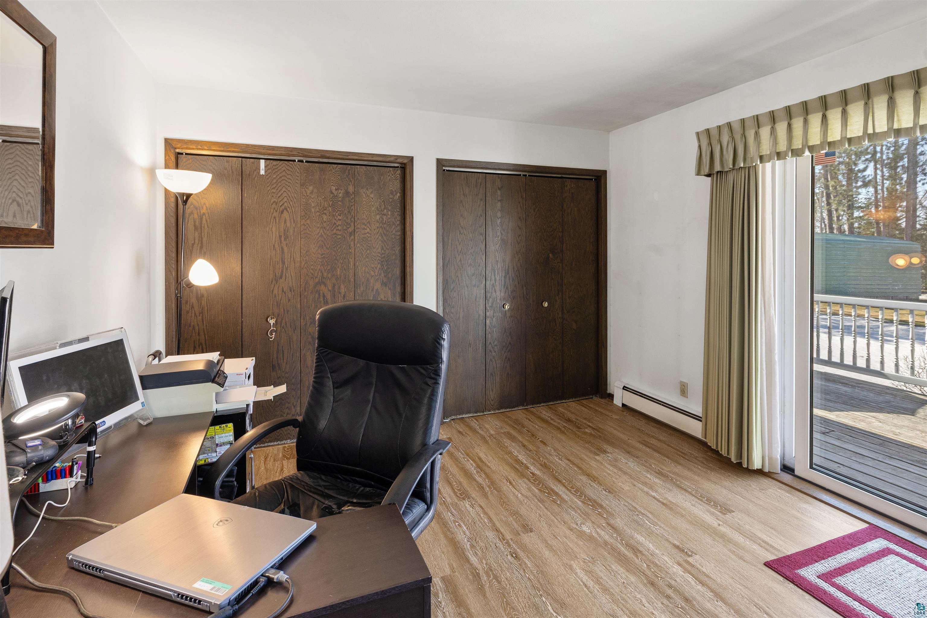 3975 Long Lake Shores Road Eveleth, MN 55734 - Photo 27 of 79 Office with baseboard heating and light wood finished floors