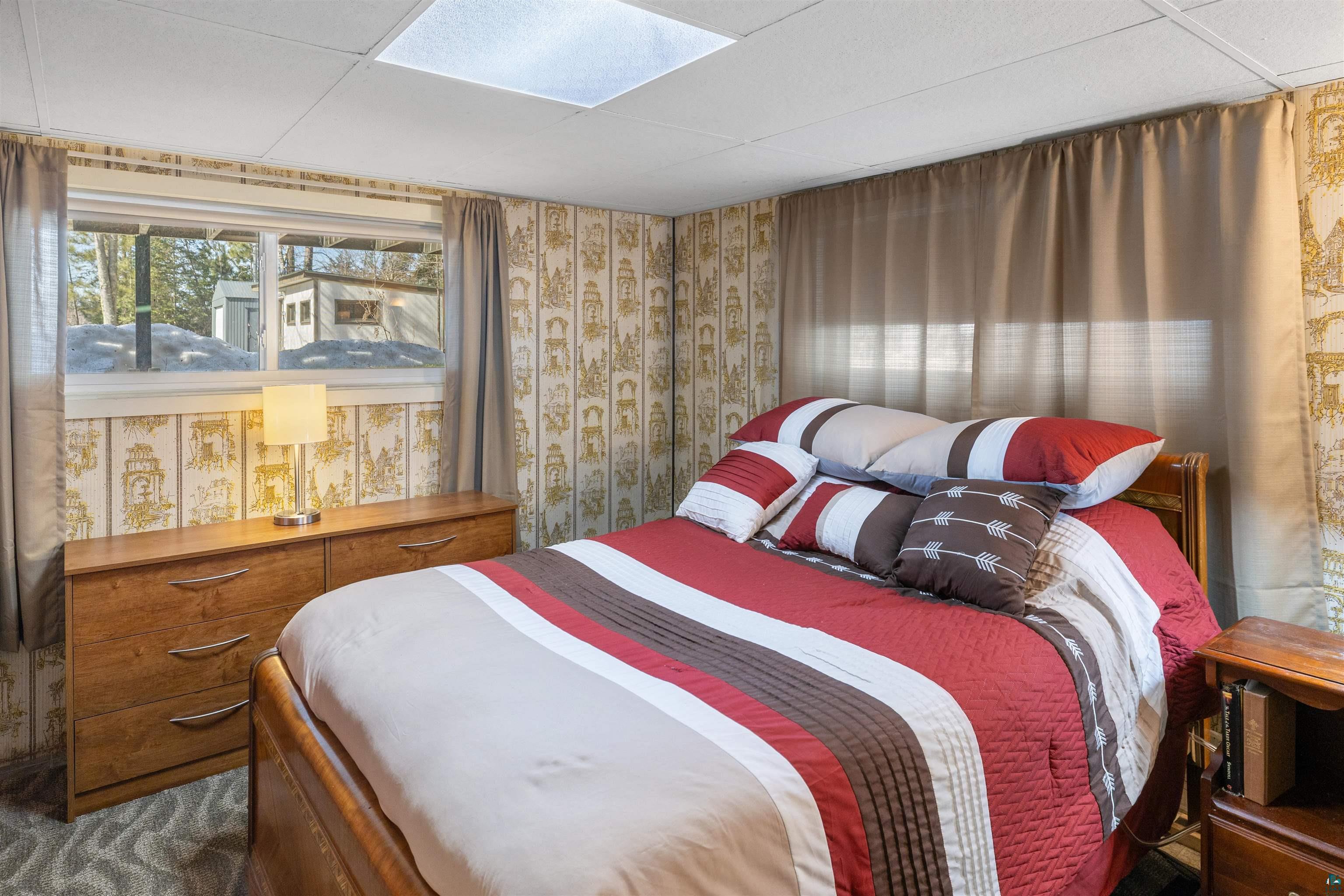 3975 Long Lake Shores Road Eveleth, MN 55734 - Photo 29 of 79 Bedroom featuring wallpapered walls