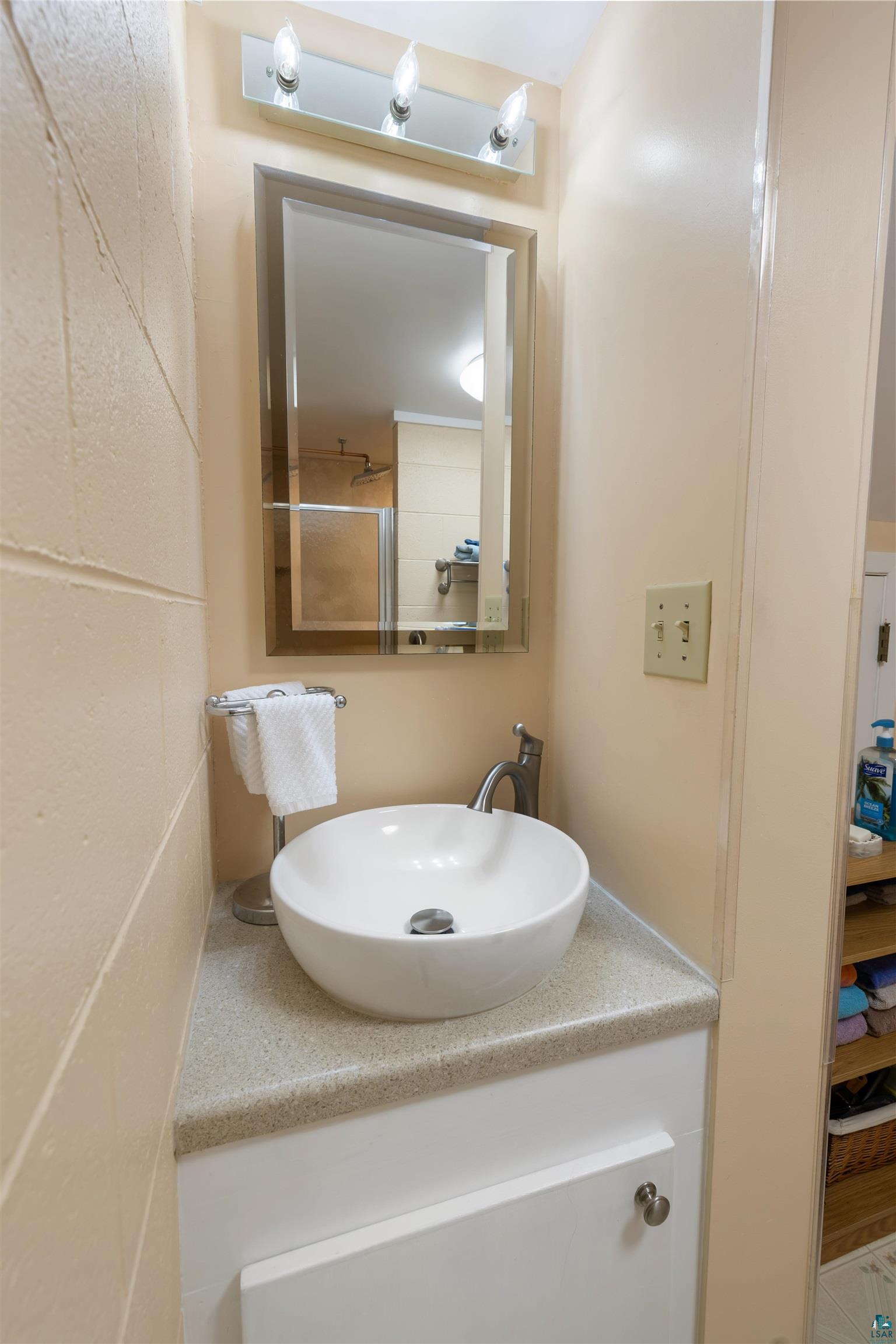 3975 Long Lake Shores Road Eveleth, MN 55734 - Photo 43 of 79 Bathroom featuring vanity and a shower