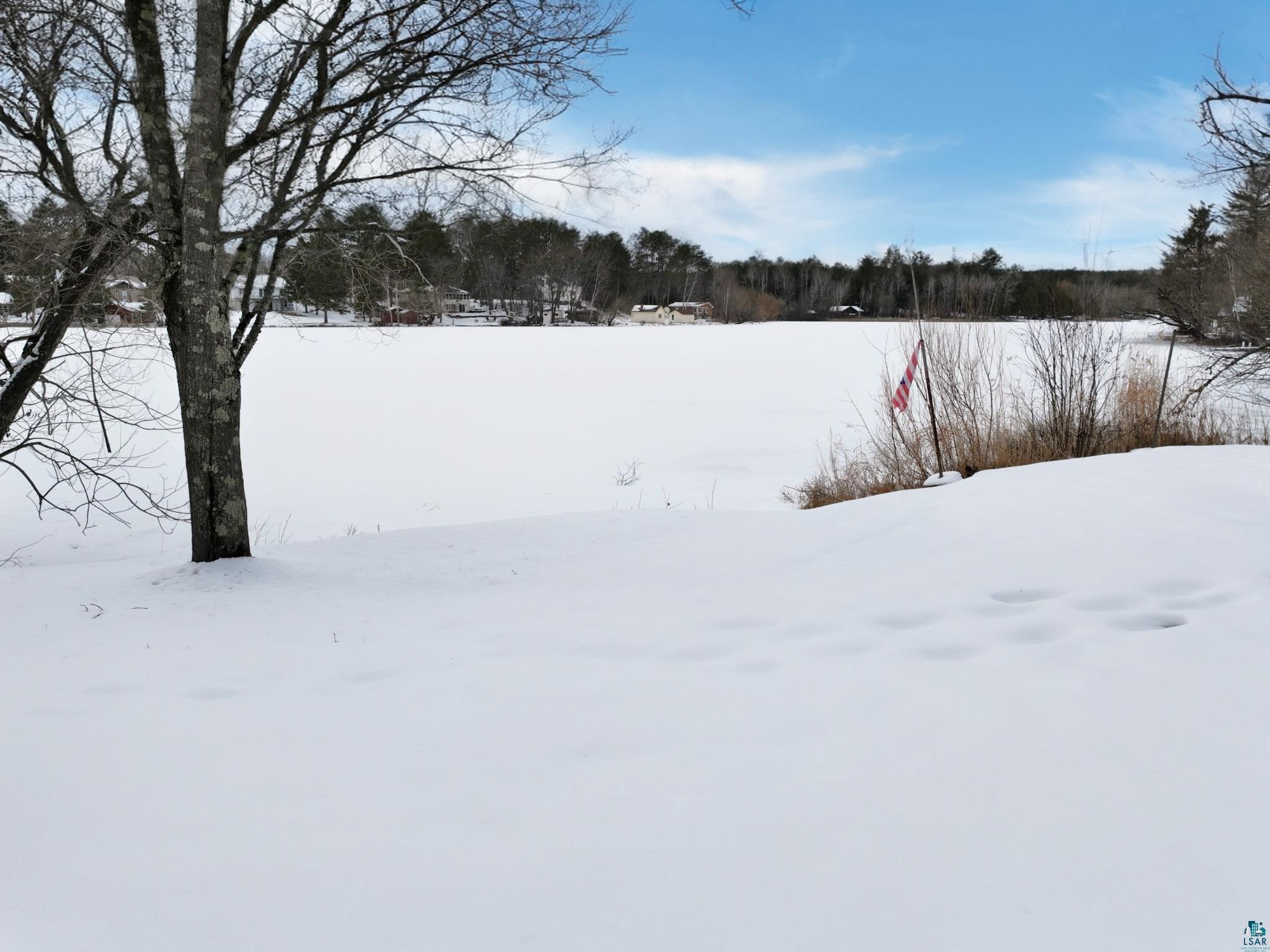 3975 Long Lake Shores Road Eveleth, MN 55734 - Photo 64 of 79 View of yard covered in snow