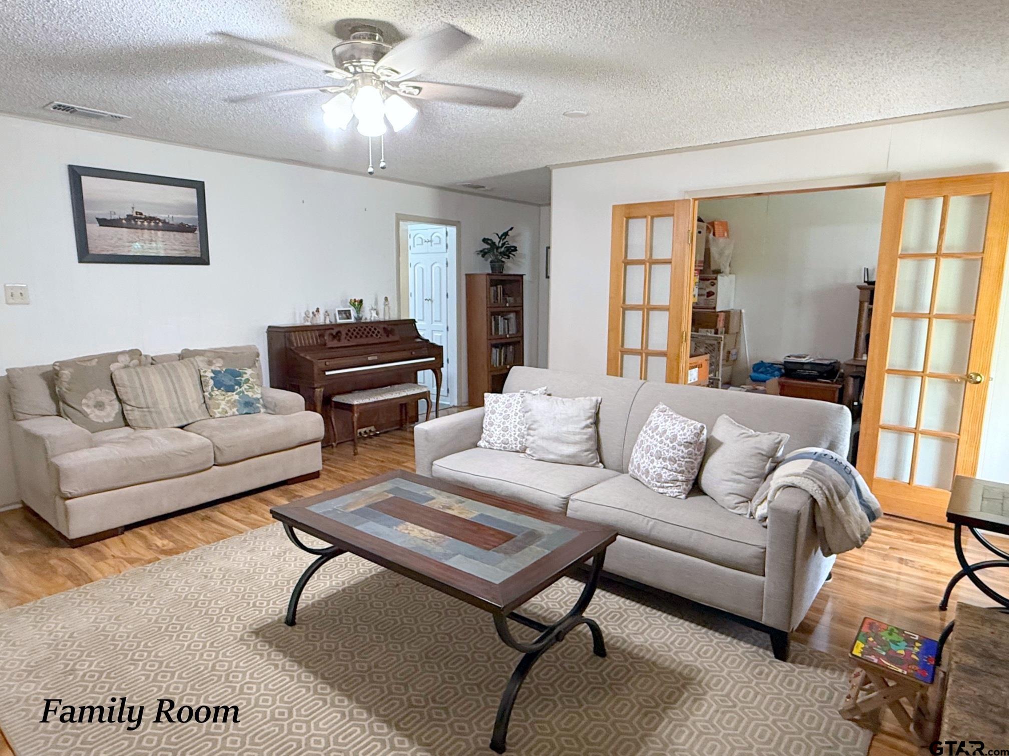 237 Oregon Street Van, TX 75790 - Photo 6 of 44 a living room with furniture and a window