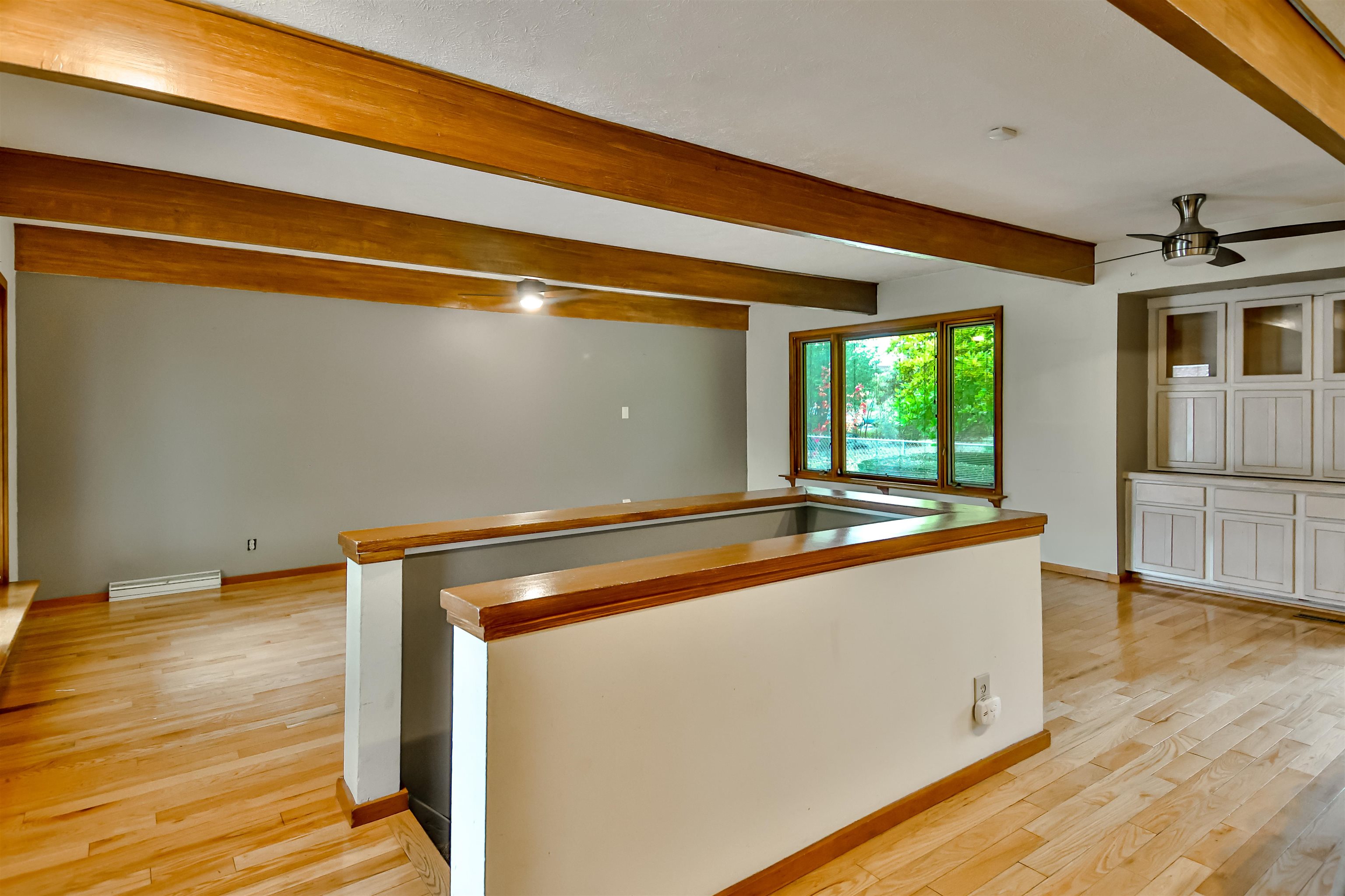 4520 Guilford Road Rockford, IL 61107 - Photo 16 of 28 a room with wooden floor and furniture