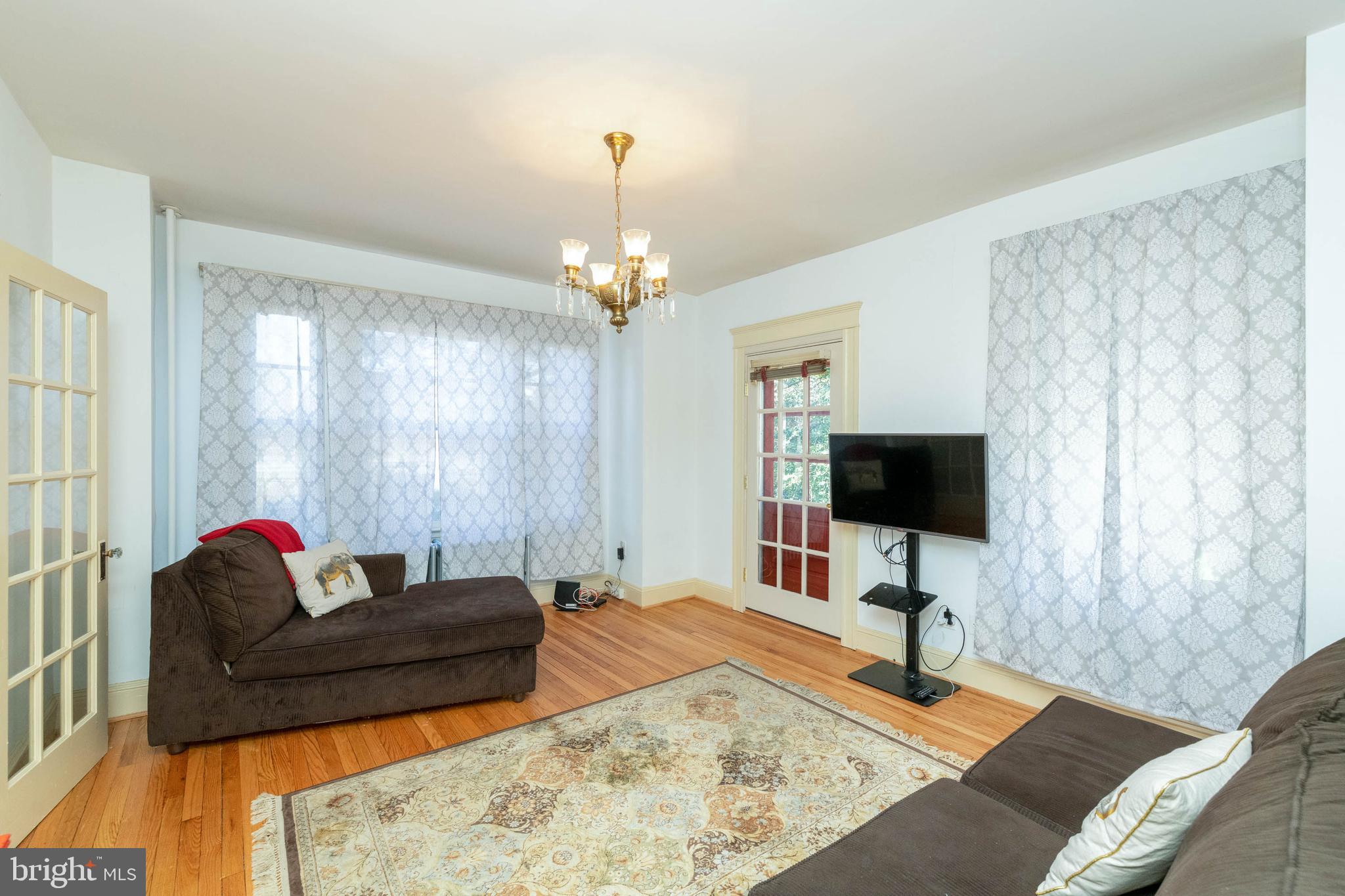 303 North Camp Meade Road Linthicum Heights, MD 21090 - Photo 11 of 36 Family Room w/porch