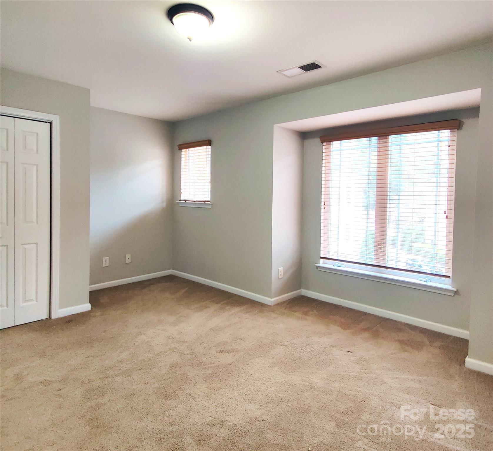 1132 Kurt Court Charlotte, NC 28209 - Photo 15 of 24 an empty room with a window