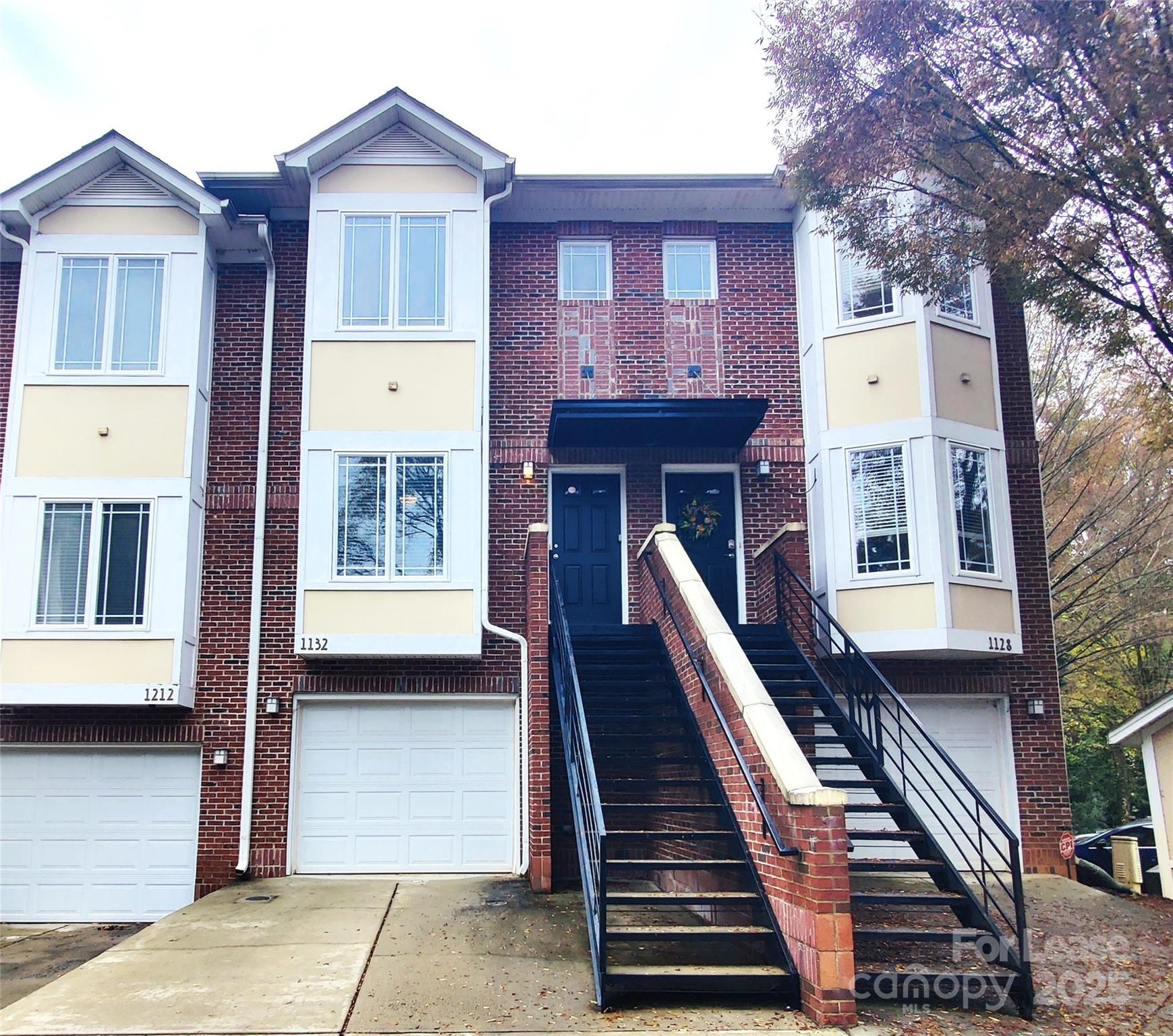 1132 Kurt Court Charlotte, NC 28209 - Photo 2 of 24 a front view of a house with stairs