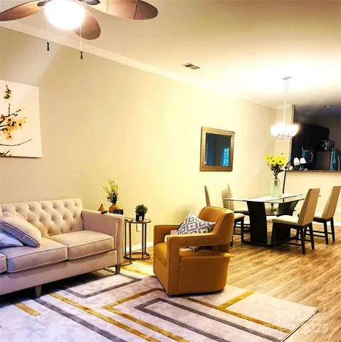 a living room with furniture and a couch