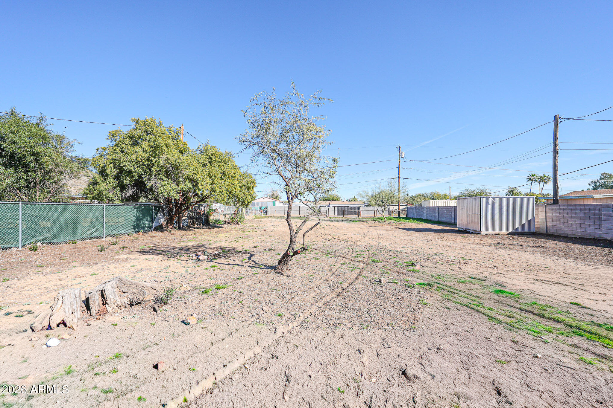 12819 North 22nd Place Phoenix, AZ 85022 - Photo 18 of 28 a view of a backyard of the house