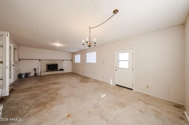 a view of a kitchen with a sink and a stove top oven