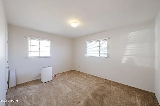 a view of a room that has a window