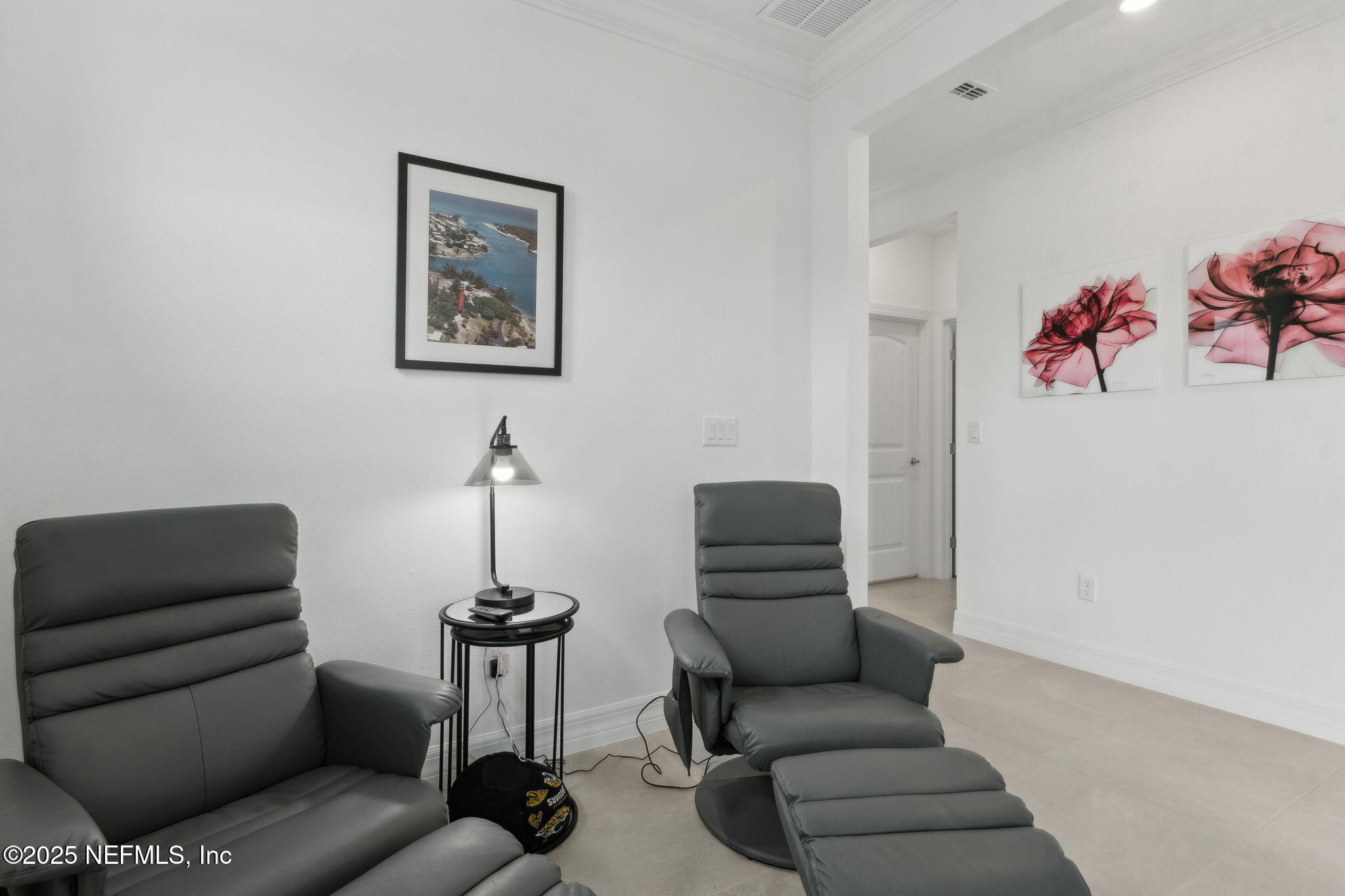 350 Tranquil Trl Circle Yulee, FL 32097 - Photo 13 of 33 a living room with furniture a couch and a chandelier