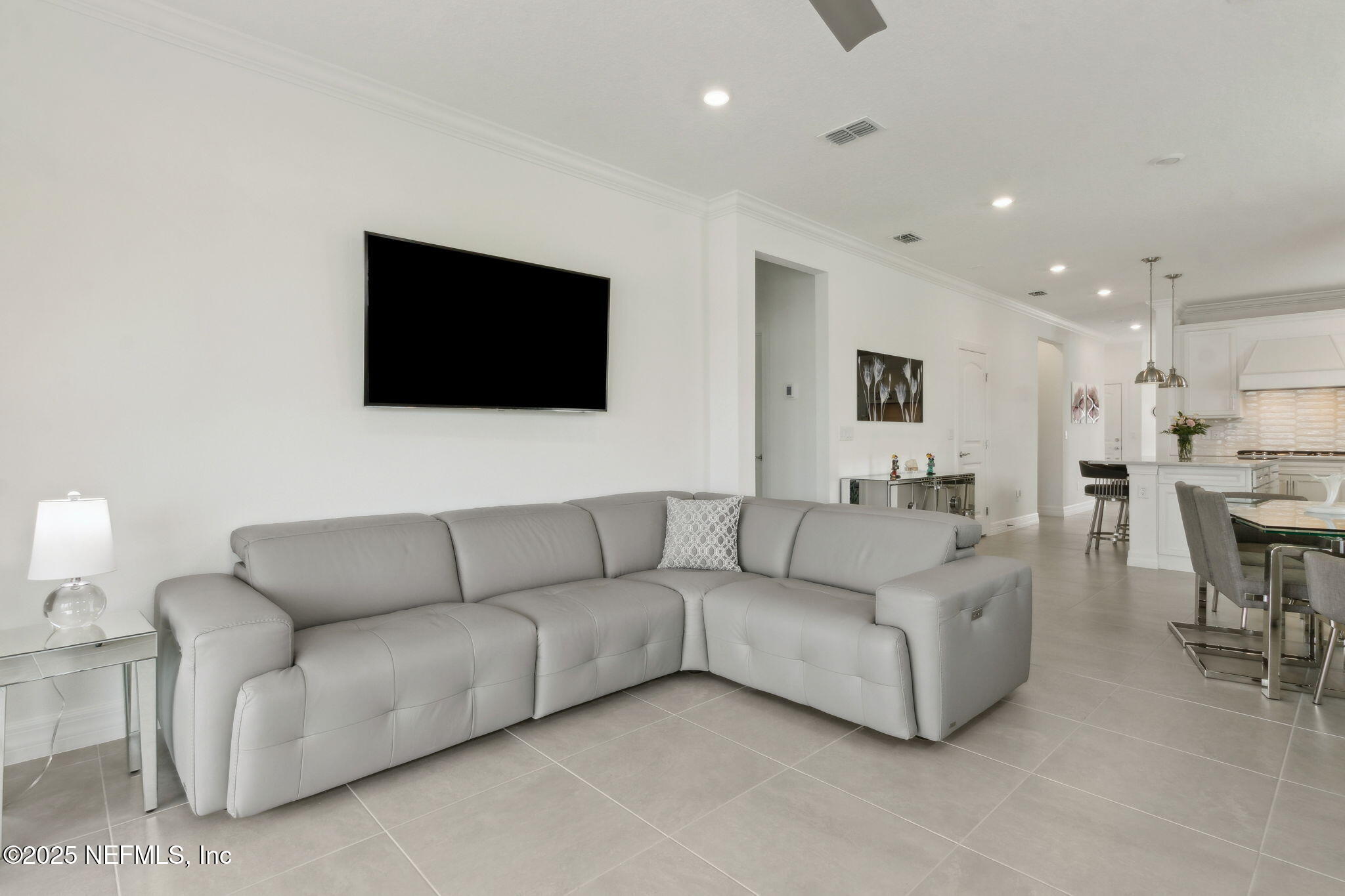 350 Tranquil Trl Circle Yulee, FL 32097 - Photo 7 of 33 a living room with furniture and a flat screen tv