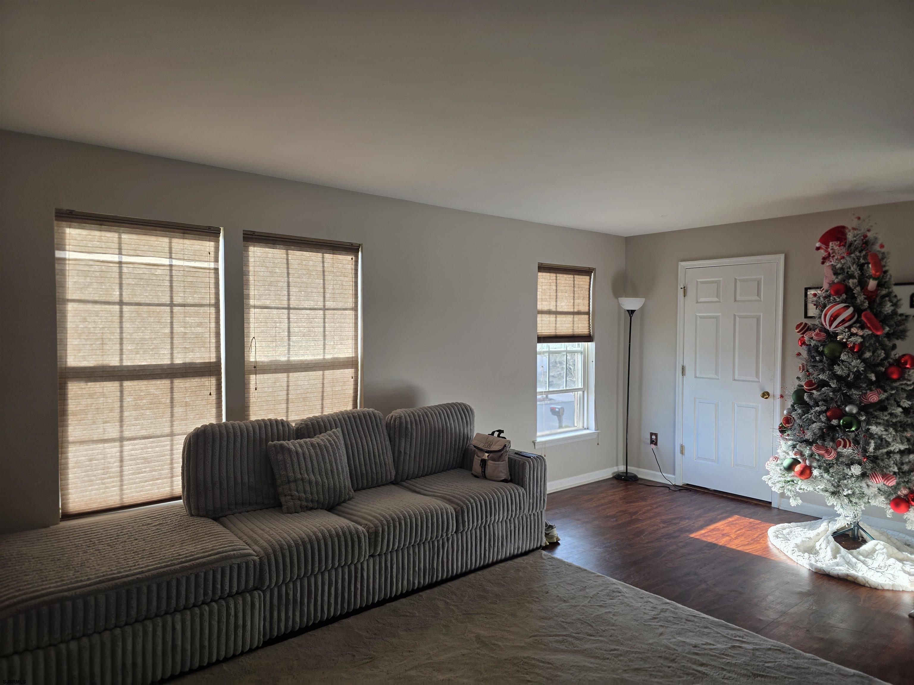 1002 Carlisle Road Egg Harbor Township, NJ 08234 - Photo 13 of 18 a living room with furniture window and potted plant