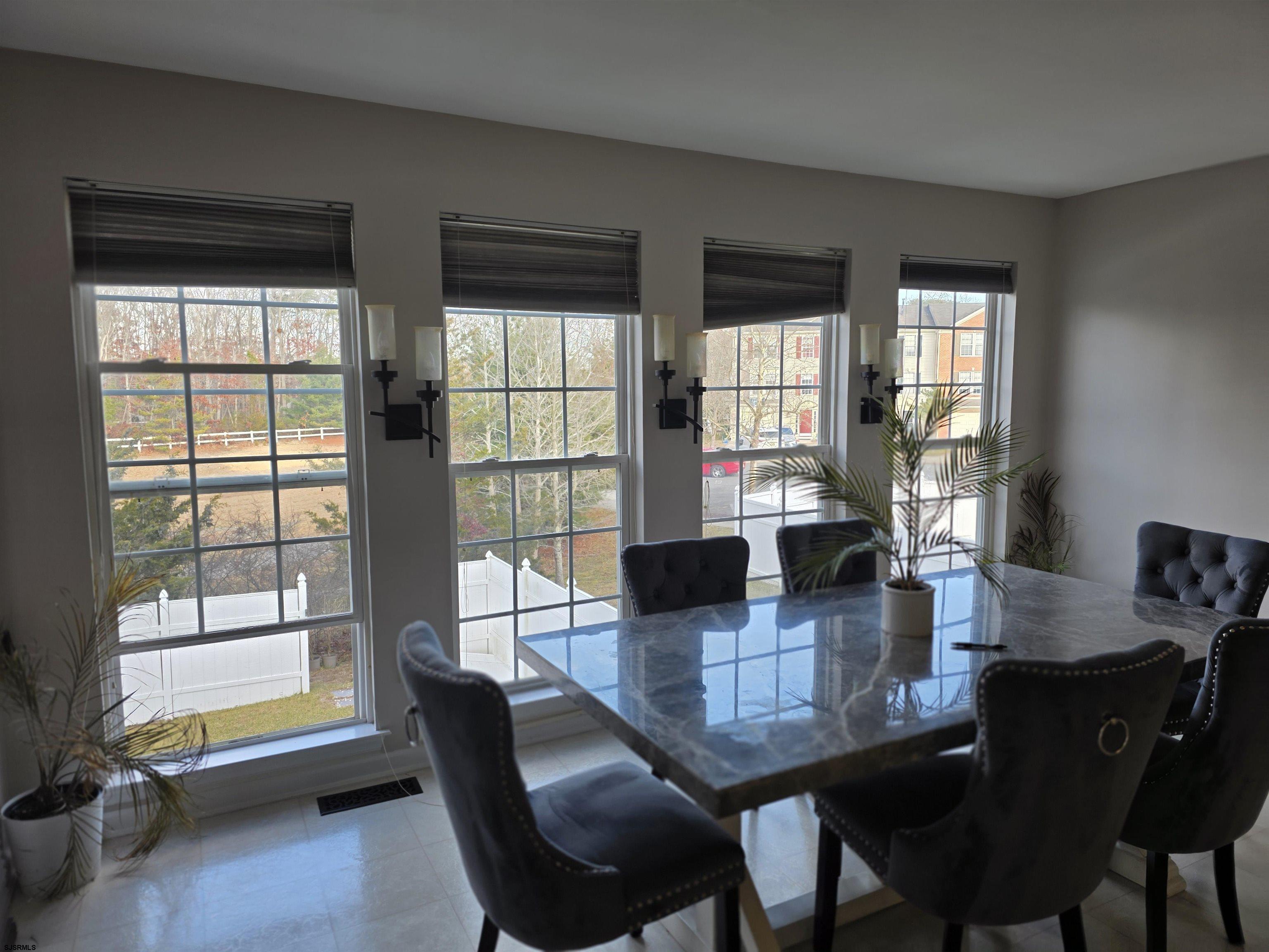1002 Carlisle Road Egg Harbor Township, NJ 08234 - Photo 4 of 18 a dining room with furniture and window