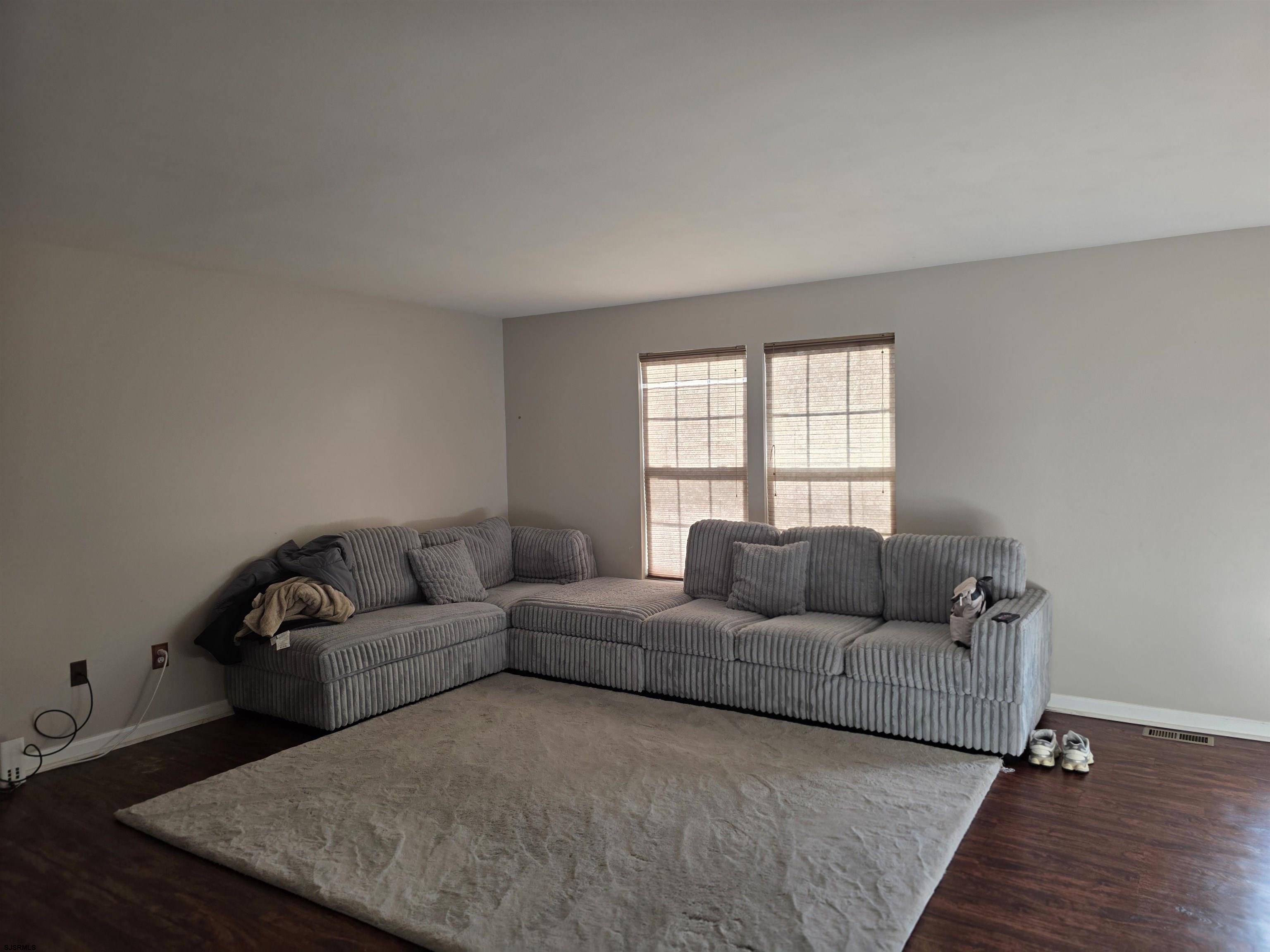 1002 Carlisle Road Egg Harbor Township, NJ 08234 - Photo 6 of 18 a living room with furniture and a window