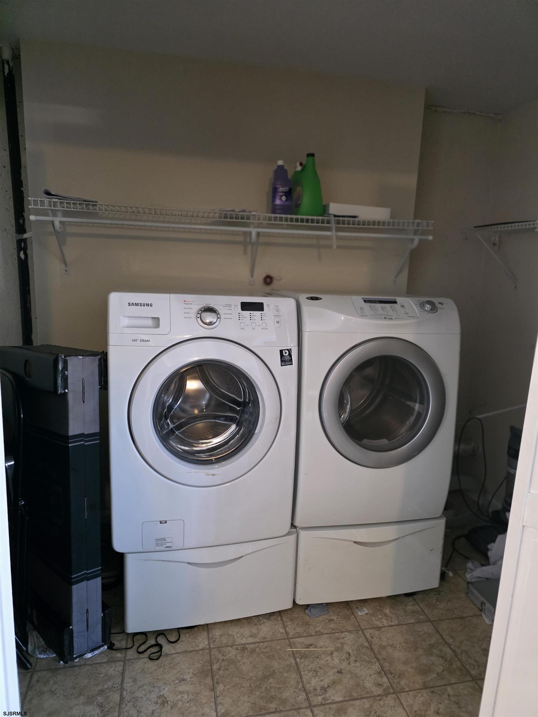 1002 Carlisle Road Egg Harbor Township, NJ 08234 - Photo 8 of 18 a utility room with dryer and washer