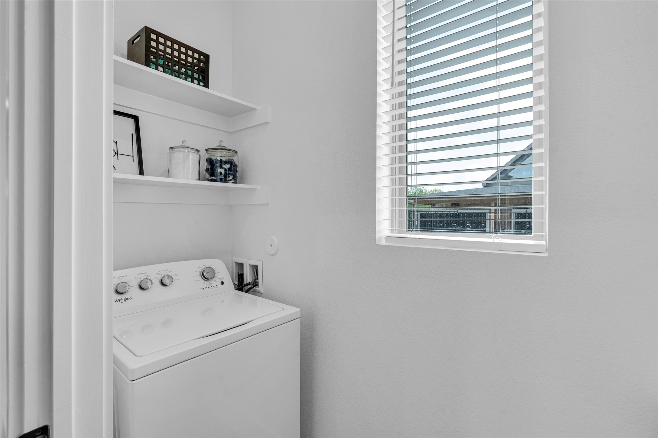 1505 A Provident Drive Little Elm, TX 75068 - Photo 26 of 41 a view of utility room with washer and dryer