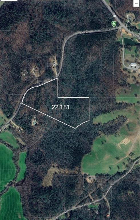 0 Afton Road Dawsonville, GA 30534 - Photo 26 of 28 a backyard of a house with lots of green space and garden