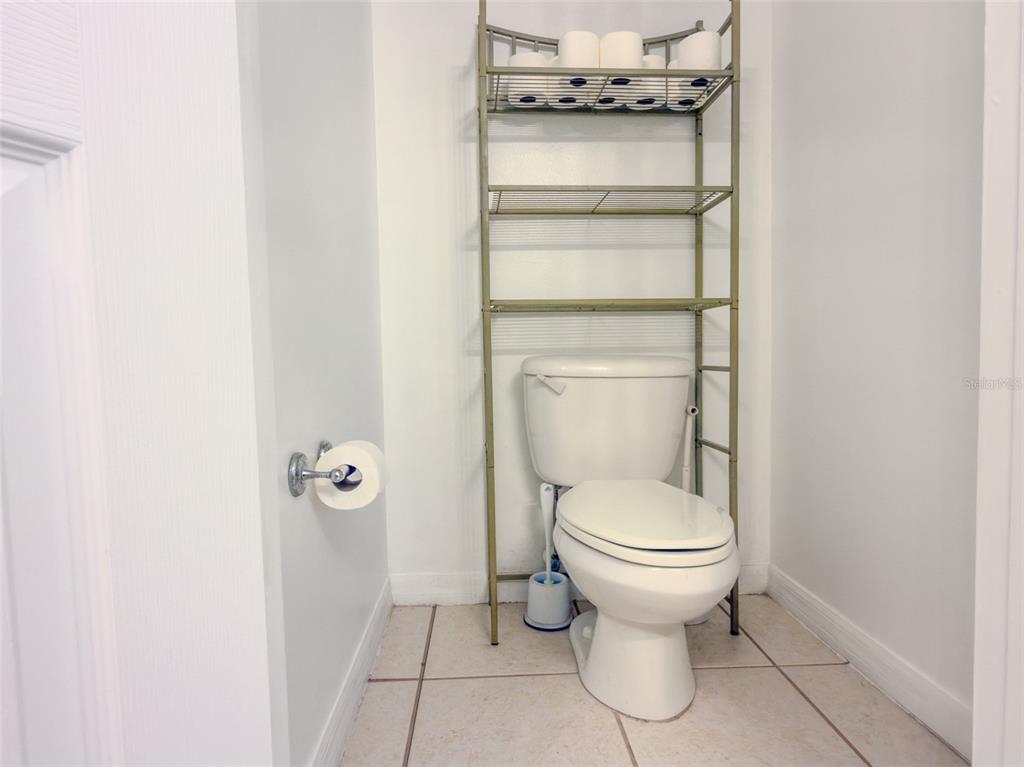 4 Weston Road Leesburg, FL 34748 - Photo 26 of 55 a bathroom with a toilet and a sink