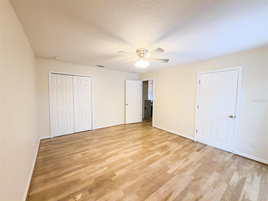 4 Weston Road Leesburg, FL 34748 - Photo 37 of 55 a view of an empty room with a ceiling fan