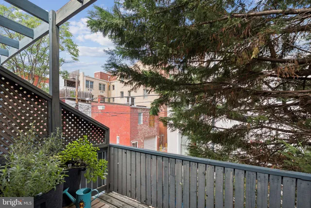 a balcony view with a street view