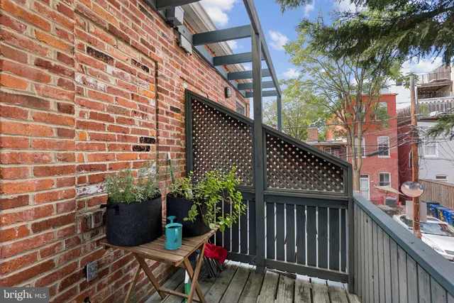 a view of a balcony with an outdoor space
