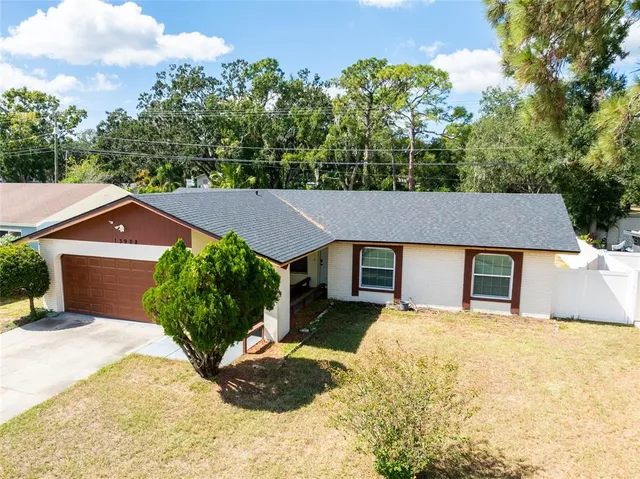 front view of a house with a yard
