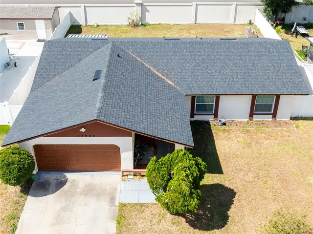 a view of swimming pool with outdoor seating