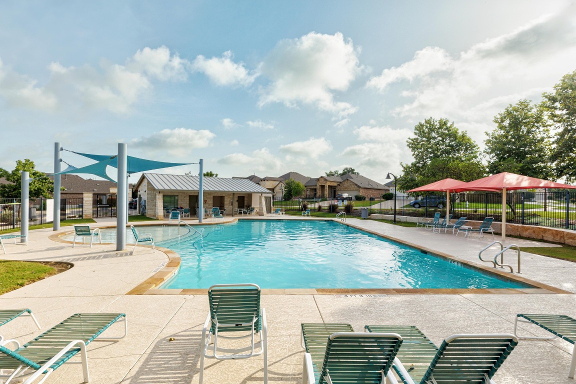 11201 Old Quarry Road Austin, TX 78717 - Photo 30 of 33 a view of a swimming pool and lounge chairs in patio