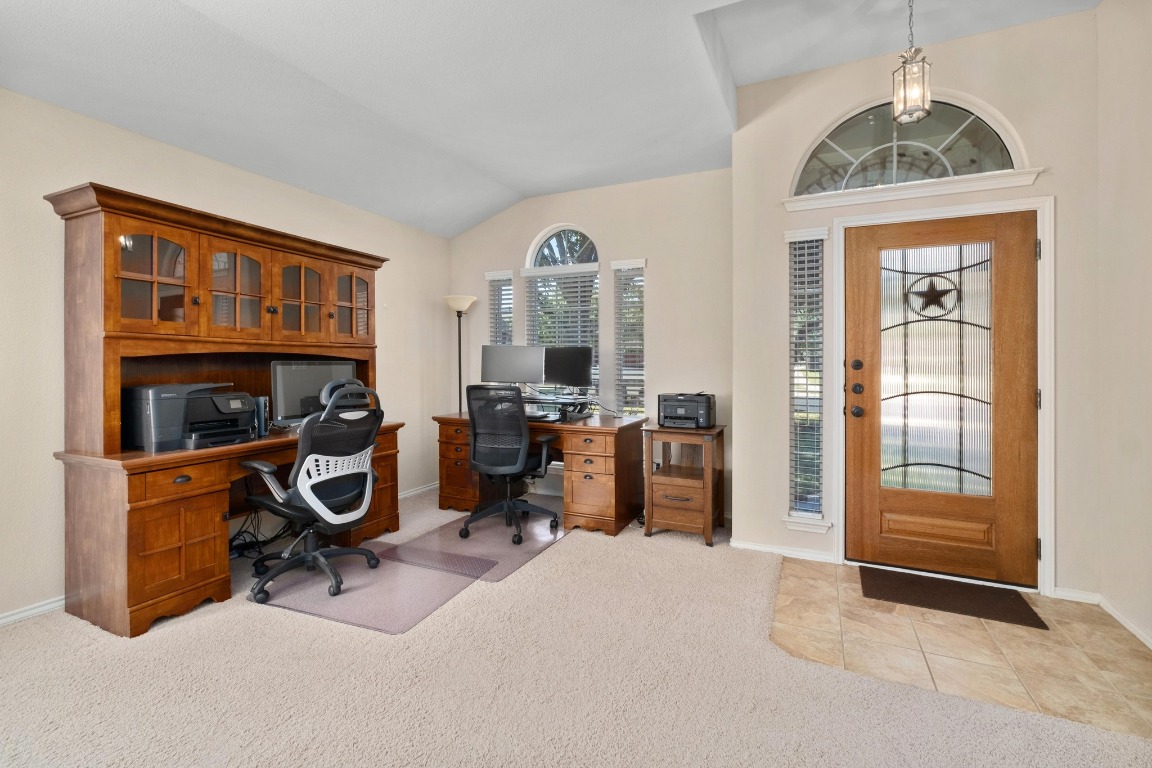 11201 Old Quarry Road Austin, TX 78717 - Photo 6 of 33 a view of a livingroom with workspace and a window