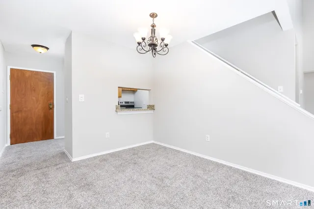 a view of livingroom with chandelier