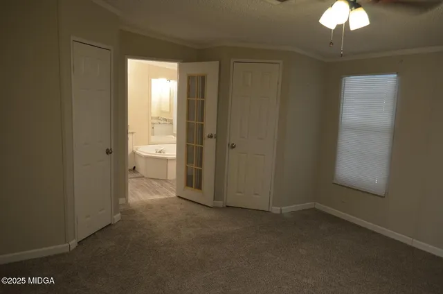 an empty room with a bathroom