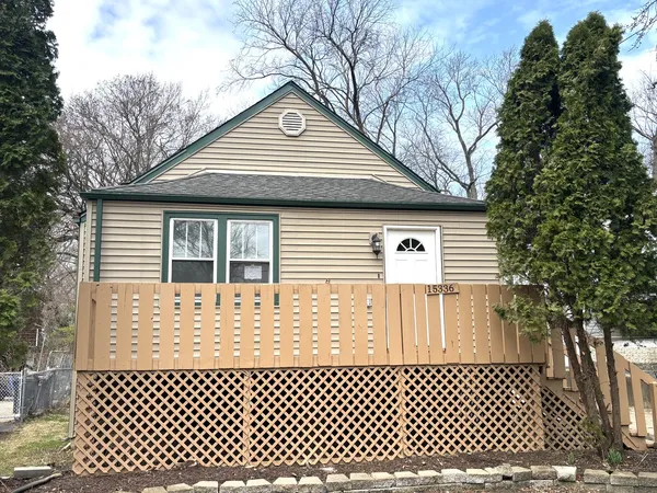 a view of a house with a large window