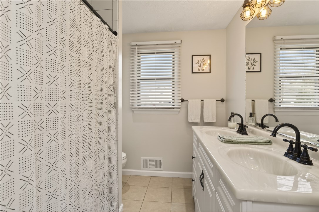 91 Emerald Point Chili, NY 14624 - Photo 23 of 36 Beautiful full-bathroom featuring a double wide va