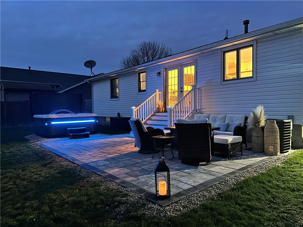 91 Emerald Point Chili, NY 14624 - Photo 31 of 36 Hot tub with night-time LED lights perfect for eve