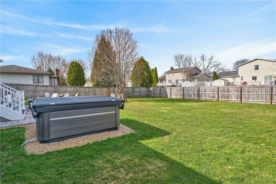 91 Emerald Point Chili, NY 14624 - Photo 32 of 36 Spacious backyard with fully privacy-fended yard!