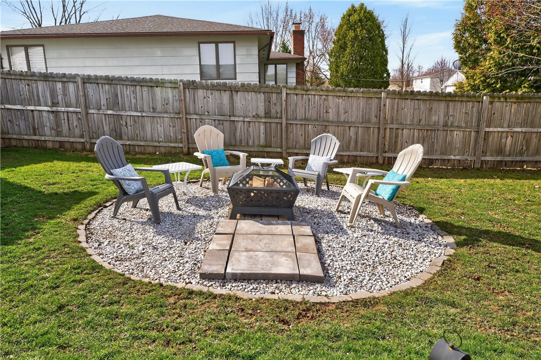 91 Emerald Point Chili, NY 14624 - Photo 33 of 36 Dedicated gravel fire pit!
