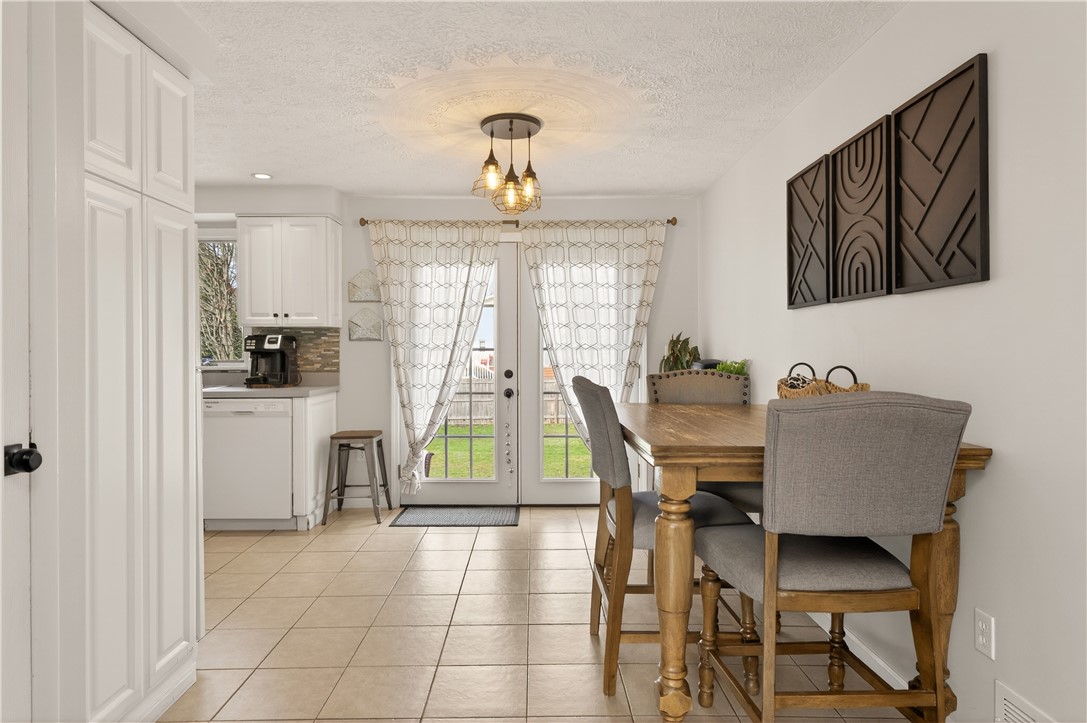 91 Emerald Point Chili, NY 14624 - Photo 10 of 36 Spacious eat-in kitchen with French doors leading