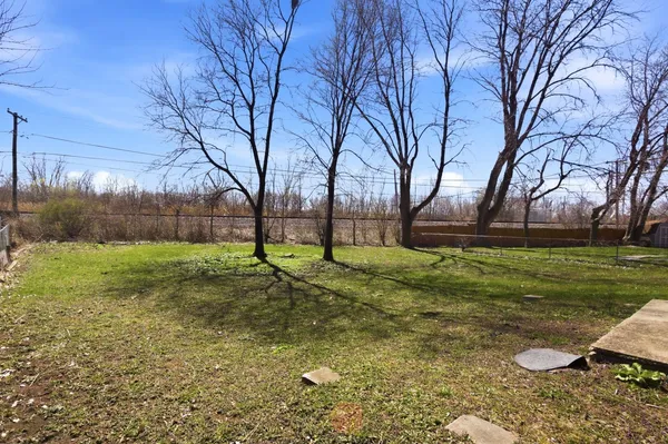 a view of yard with tree s