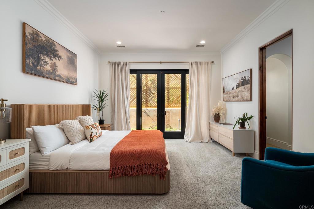 18000 Sunset Point Road Poway, CA 92064 - Photo 20 of 36 a bedroom with a bed and a couch