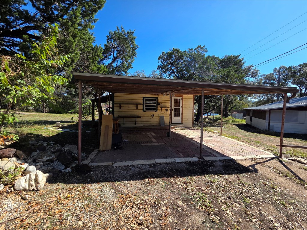 9813 Trails End Road Leander, TX 78641 - Photo 1 of 1 a view of a patio with wooden floor