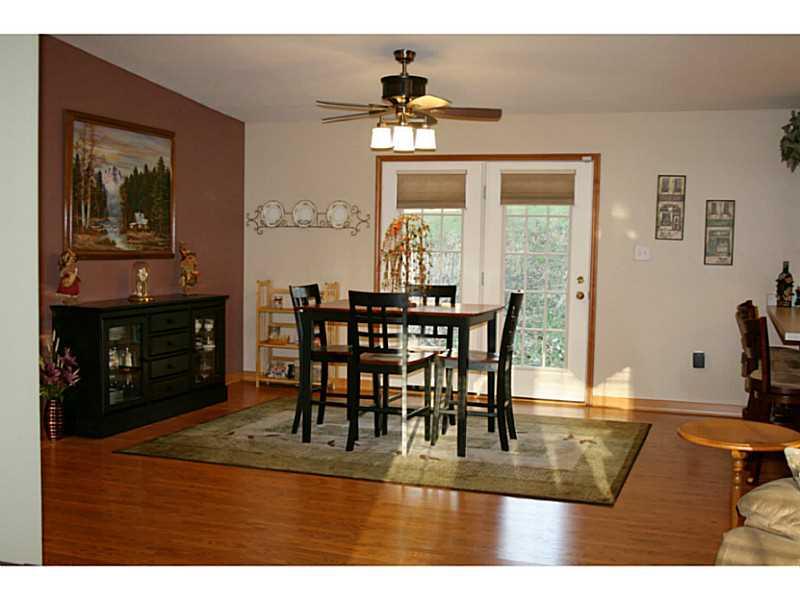 314 Weber Road Sewickley, PA 15143 - Photo 8 of 23 Dining Room. Classy french doors overlook the back yard letting in lots of natural light and nature. Custom made blinds stay with the house.