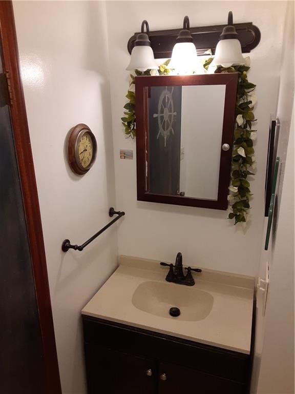 211 Rural Valley Road Claysville, PA 15323 - Photo 19 of 22 a bathroom with a sink and a mirror