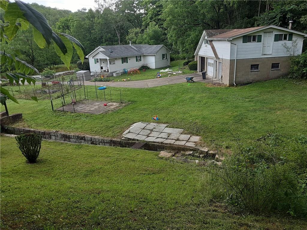 211 Rural Valley Road Claysville, PA 15323 - Photo 5 of 22 a view of a house with backyard