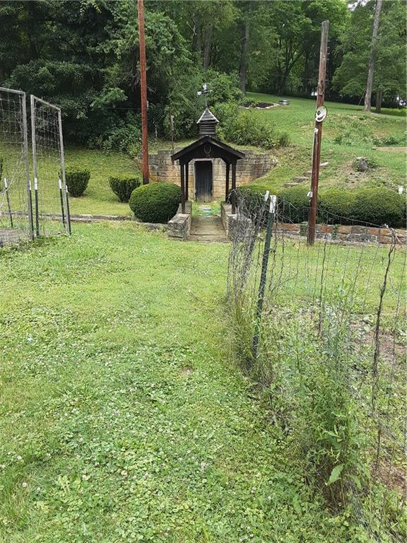 211 Rural Valley Road Claysville, PA 15323 - Photo 6 of 22 a house view with a garden space