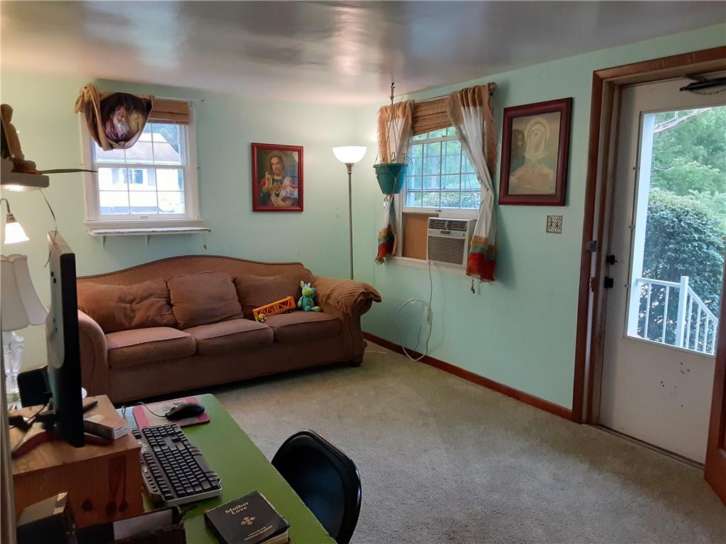211 Rural Valley Road Claysville, PA 15323 - Photo 8 of 22 a living room with furniture and a window