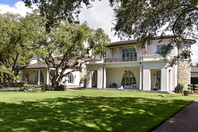 a view of entrance gate of a house