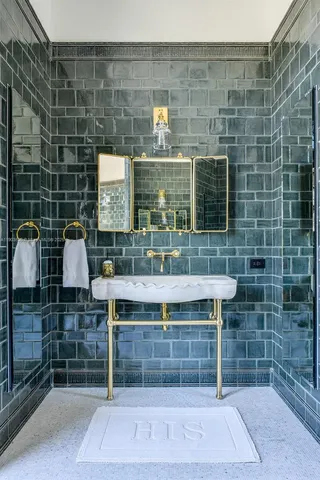 a bed room with a bed and a chair